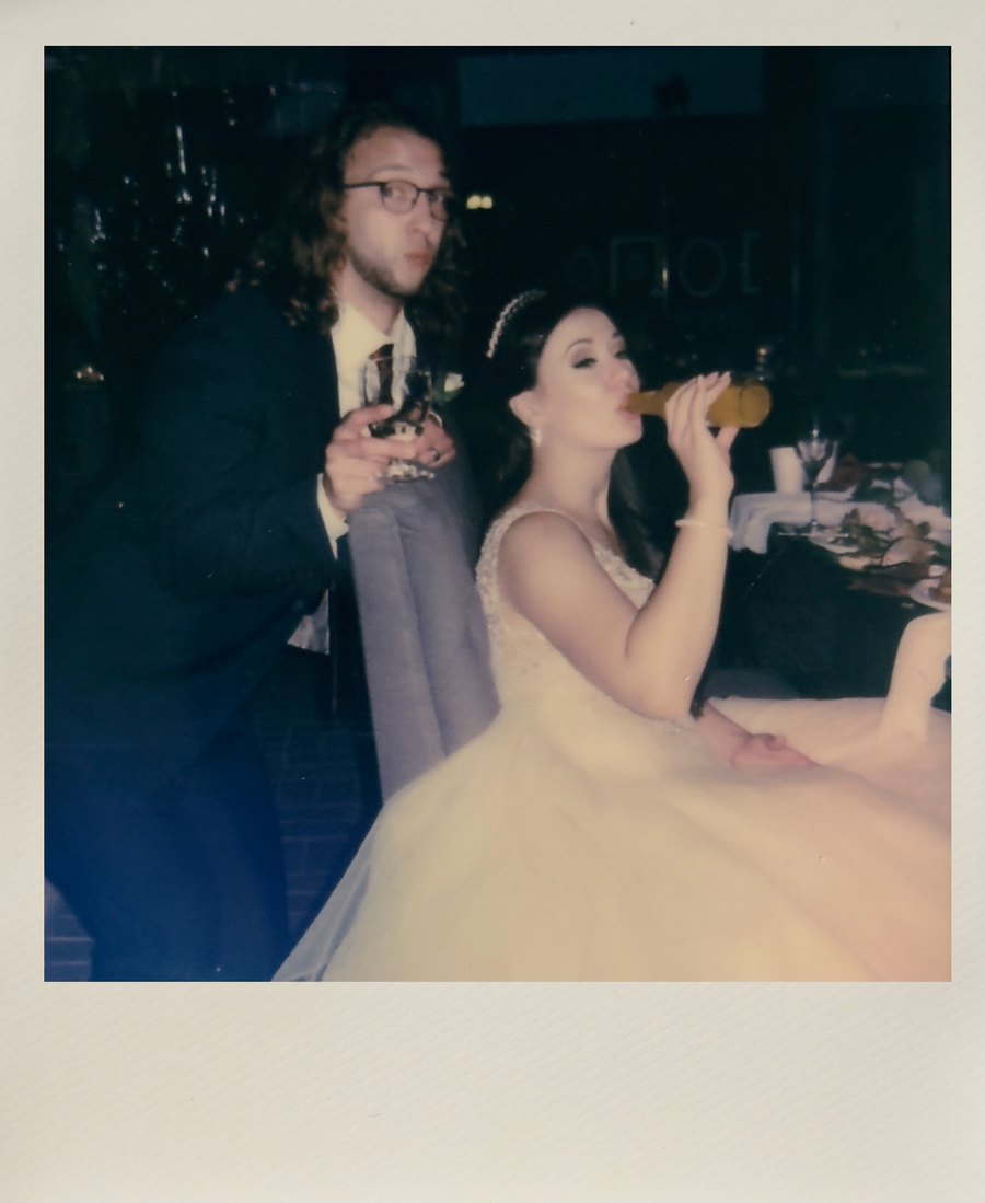 Instant wedding photo of the couple at the reception